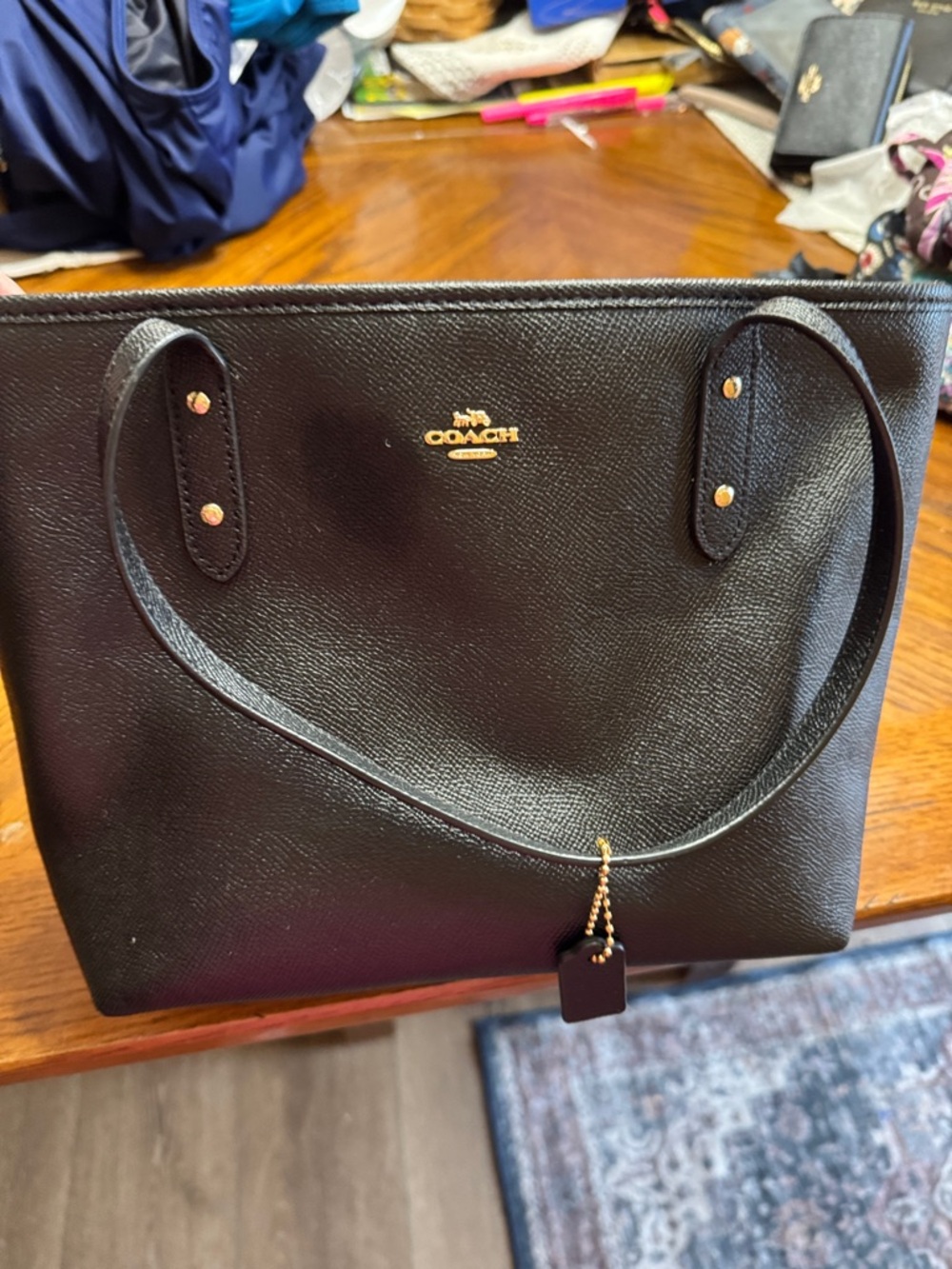 Coach Black Leather Tote with Gold Hardware and Charm